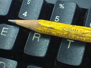 Pencil on keyboard